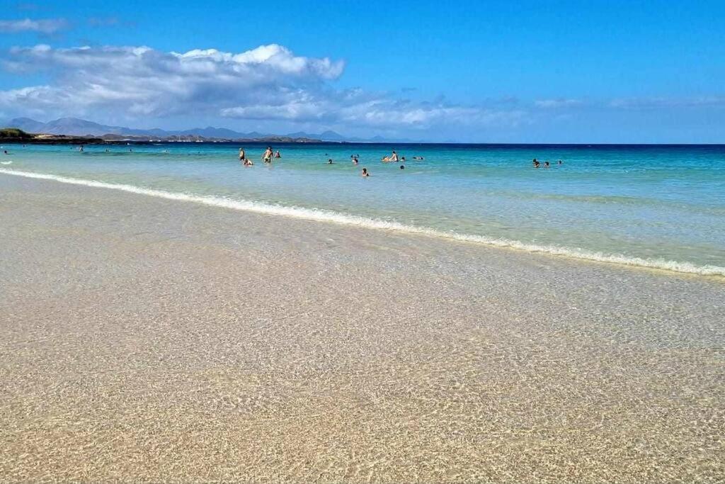 Appartamento Bouganville Con Terrazza E Piscina Коральео Экстерьер фото